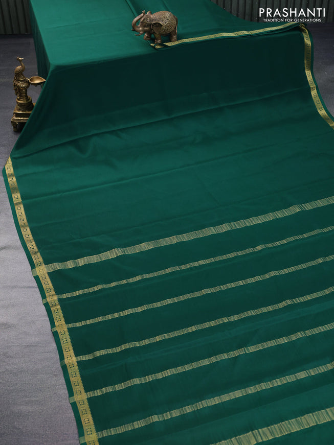 Pure mysore silk saree dark green with plain body and zari woven border