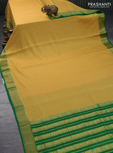 Pure mysore silk saree mustard yellow and green with allover self emboss and zari woven border