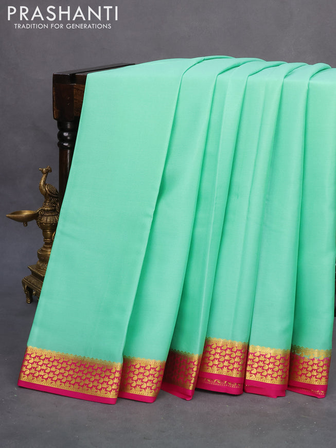 Pure mysore silk saree teal green and pink with plain body and zari woven border