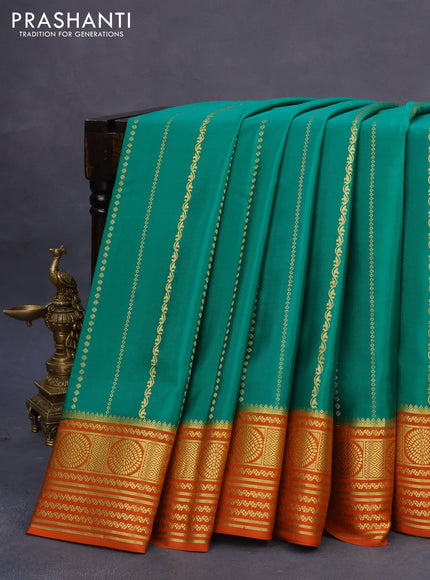 Pure mysore silk saree green and orange with allover zari weaves and rich zari woven border