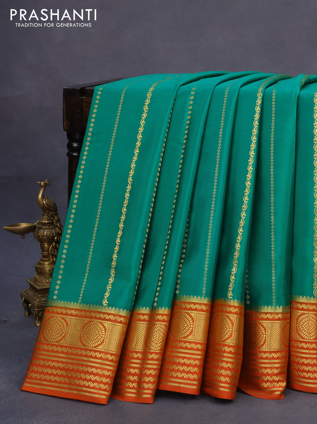 Pure mysore silk saree green and orange with allover zari weaves and rich zari woven border