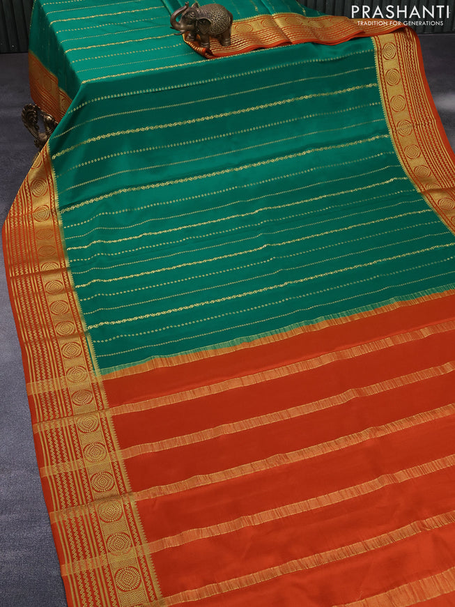 Pure mysore silk saree green and orange with allover zari weaves and rich zari woven border