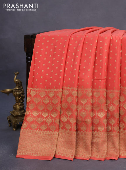 Pure mysore silk saree peach orange and black with allover zari woven butta weaves and long zari woven border