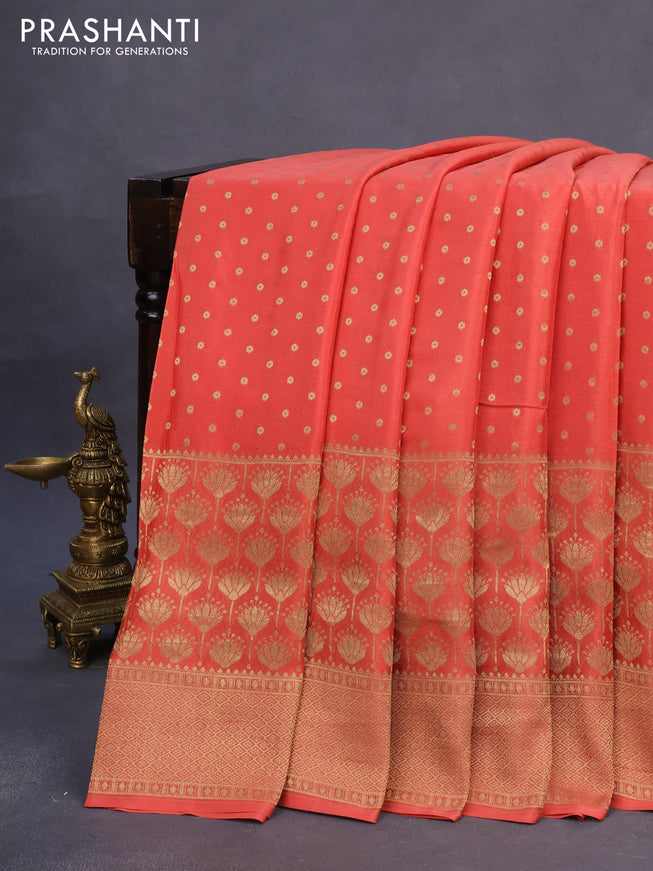 Pure mysore silk saree peach orange and black with allover zari woven butta weaves and long zari woven border