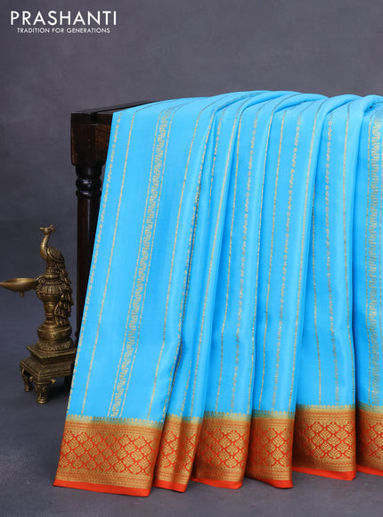 Pure mysore silk saree light blue and orange with allover zari weaves and rich zari woven border