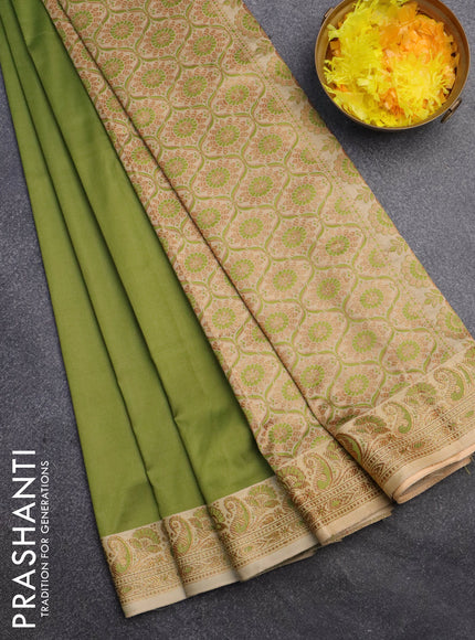 Banarasi semi katan saree mehendi green and cream with plain body with thread & zari woven border