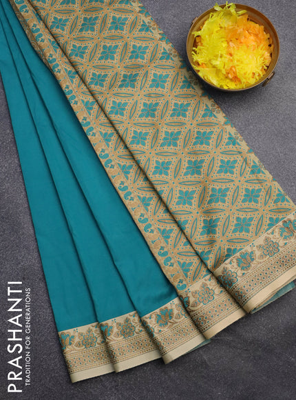 Banarasi semi katan saree teal blue and sandal with plain body and thread & zari woven border