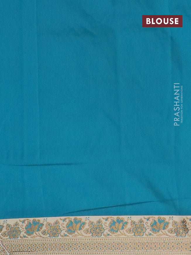 Banarasi semi katan saree teal blue and sandal with plain body and thread & zari woven border