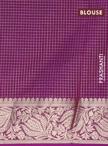 Semi crepe saree teal green and purple with allover zari checks & buttas and zari woven border