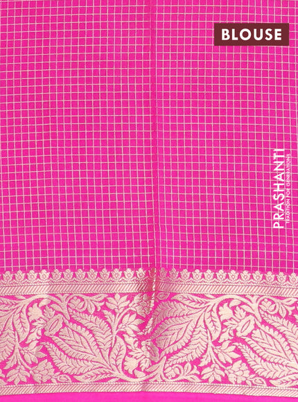 Semi crepe saree black and pink with allover zari checks & buttas and zari woven border