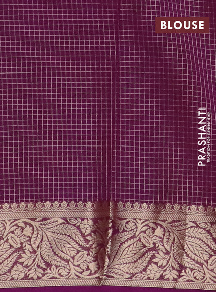 Semi crepe saree teal blue and purple with allover zari checks & buttas and zari woven border