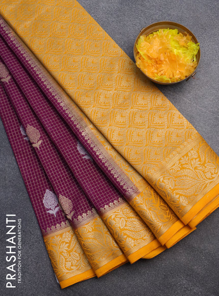 Semi crepe saree purple and mango yellow with allover zari checks & buttas and zari woven border