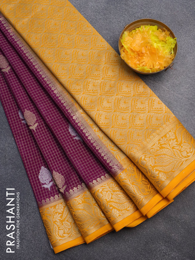 Semi crepe saree purple and mango yellow with allover zari checks & buttas and zari woven border