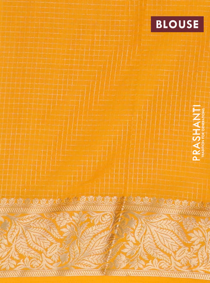 Semi crepe saree purple and mango yellow with allover zari checks & buttas and zari woven border