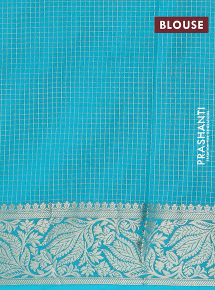 Semi crepe saree pink shade and teal blue with allover zari checks & buttas and zari woven border