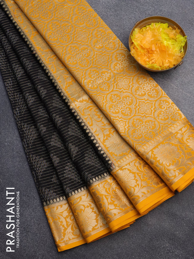 Semi crepe saree black and mango yellow with allover zari weaves and zari woven border