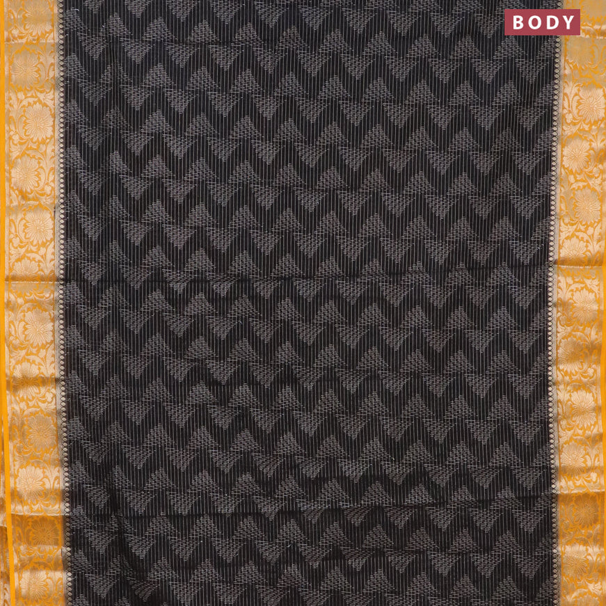 Semi crepe saree black and mango yellow with allover zari weaves and zari woven border