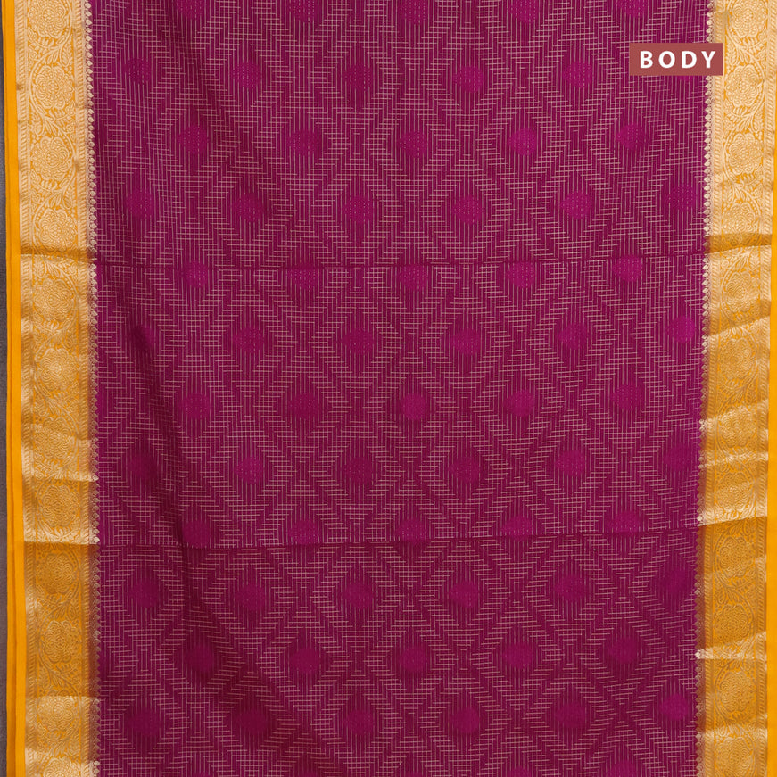 Semi crepe saree purple and mango yellow with allover zari checks & self emboss butta and zari woven border