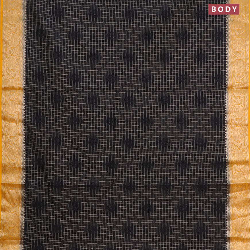 Semi crepe saree black and mango yellow with allover zari checks & self emboss butta and zari woven border