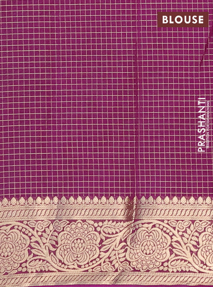 Semi crepe saree teal green and purple with allover zari checks & self emboss butta and zari woven border