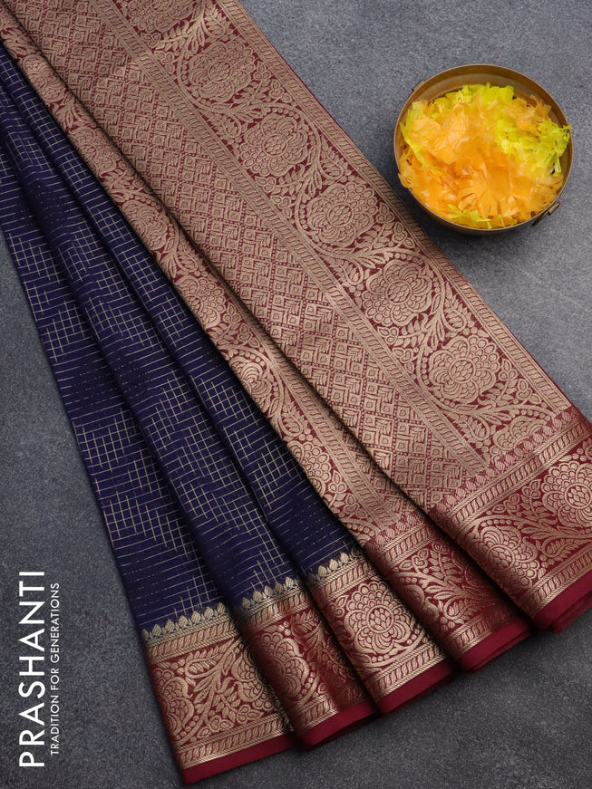 Semi crepe saree navy blue and deep maroon with allover zari checks & self emboss butta and zari woven border