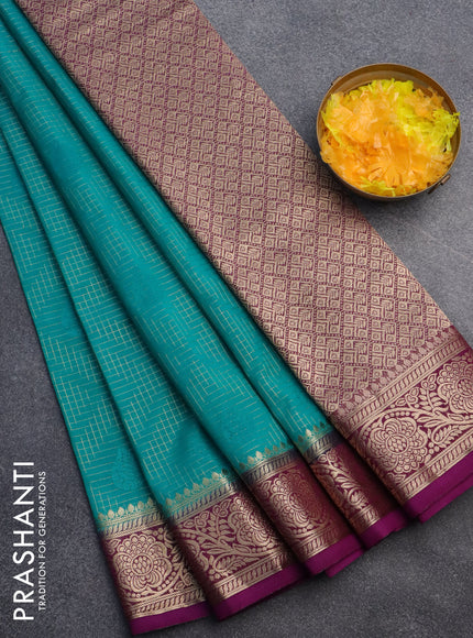 Semi crepe saree teal green shade and purple with allover zari checks & self emboss butta and zari woven border