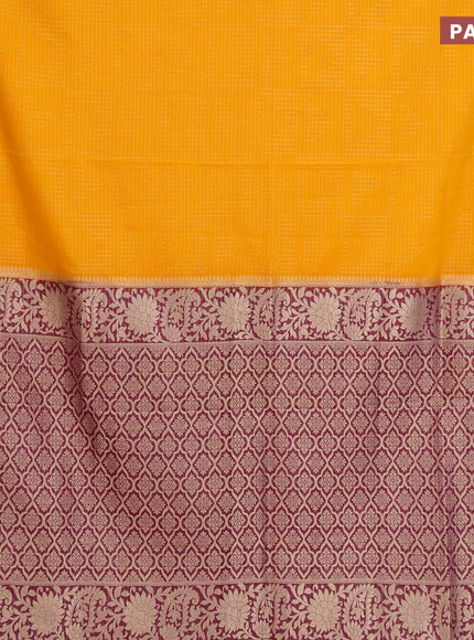 Semi crepe saree mango yellow and purple with allover zari weaves and zari woven border