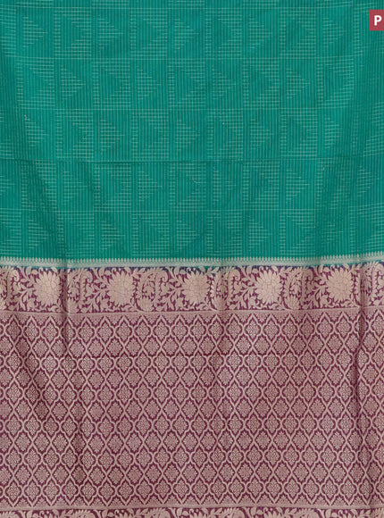 Semi crepe saree teal green and purple with allover zari weaves and zari woven border