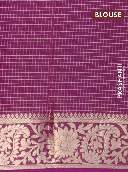 Semi crepe saree teal green and purple with allover zari weaves and zari woven border