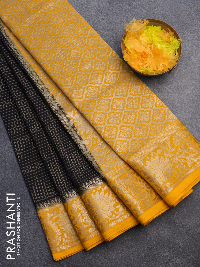 Semi crepe saree black and mango yellow with allover zari weaves and zari woven border