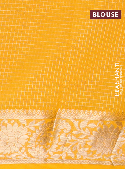 Semi crepe saree black and mango yellow with allover zari weaves and zari woven border