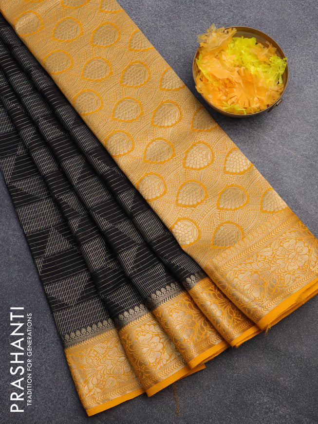 Semi crepe saree black and mango yellow with allover geometric zari weaves & self emboss and zari woven border