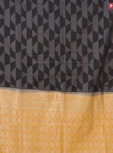 Semi crepe saree black and mango yellow with allover geometric zari weaves & self emboss and zari woven border