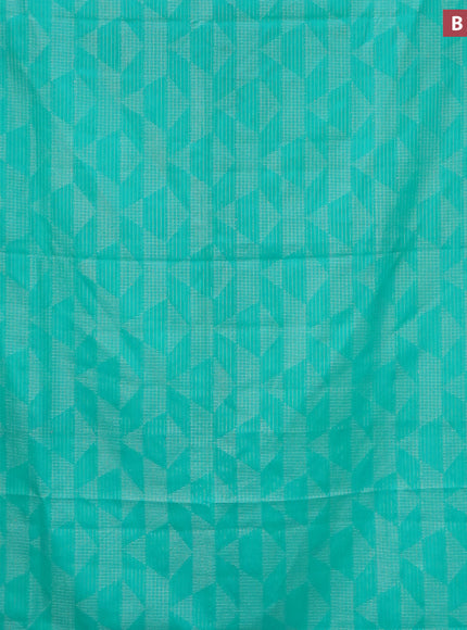 Semi crepe saree teal green and deep purple with allover geometric zari weaves & self emboss and zari woven border