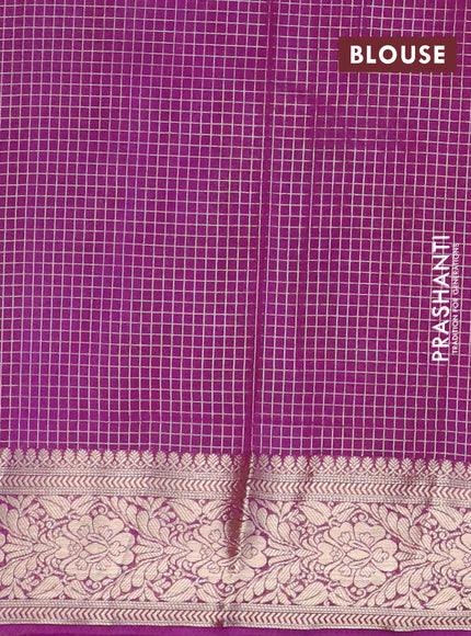 Semi crepe saree teal green and deep purple with allover geometric zari weaves & self emboss and zari woven border