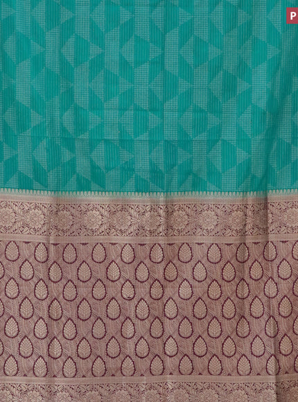 Semi crepe saree teal blue and deep purple with allover geometric zari weaves & self emboss and zari woven border