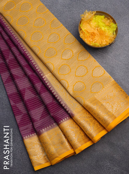 Semi crepe saree purple and mango yellow with allover geometric zari weaves & self emboss and zari woven border