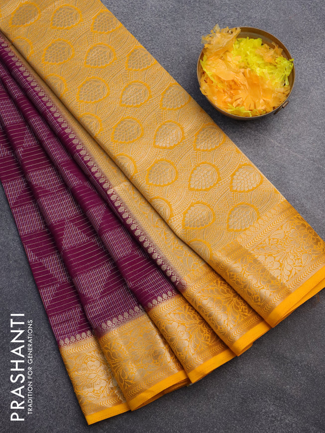 Semi crepe saree purple and mango yellow with allover geometric zari weaves & self emboss and zari woven border