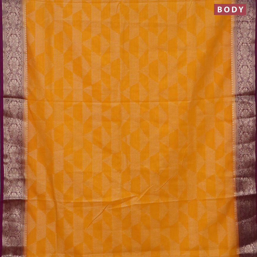 Semi crepe saree mango yellow and purple with allover geometric zari weaves & self emboss and zari woven border