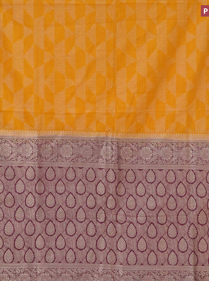 Semi crepe saree mango yellow and purple with allover geometric zari weaves & self emboss and zari woven border