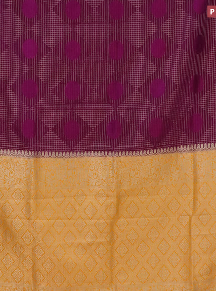 Semi crepe saree purple and mango yellow with allover geometric zari weaves & self emboss and zari woven border