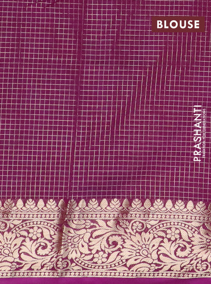 Semi crepe saree teal blue and deep purple with allover geometric zari weaves & self emboss and zari woven border