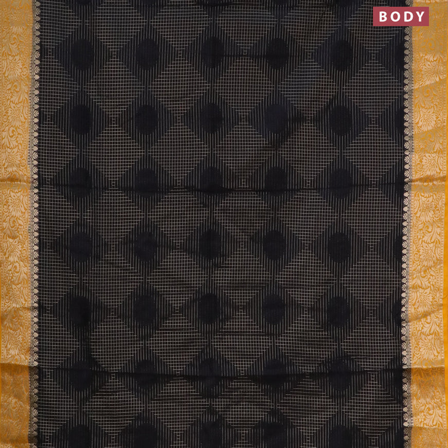 Semi crepe saree black and mango yellow with allover geometric zari weaves & self emboss and zari woven border