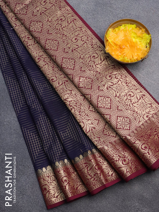 Semi crepe saree navy blue and deep maroon with allover geometric zari weaves & self emboss and zari woven border