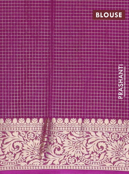 Semi crepe saree teal green and purple with allover geometric zari weaves & self emboss and zari woven border