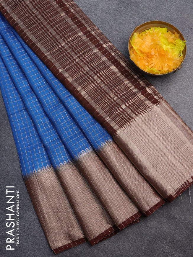 Semi crepe saree blue and coffee brown with allover small zari checked pattern and long zari woven border