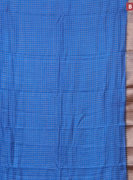 Semi crepe saree blue and coffee brown with allover small zari checked pattern and long zari woven border