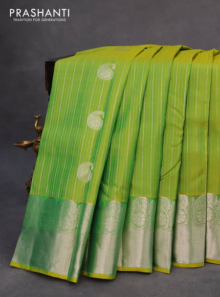 Roopam silk saree light green and dark green with allover silver zari stripes pattern & paisley buttas and silver zari woven border