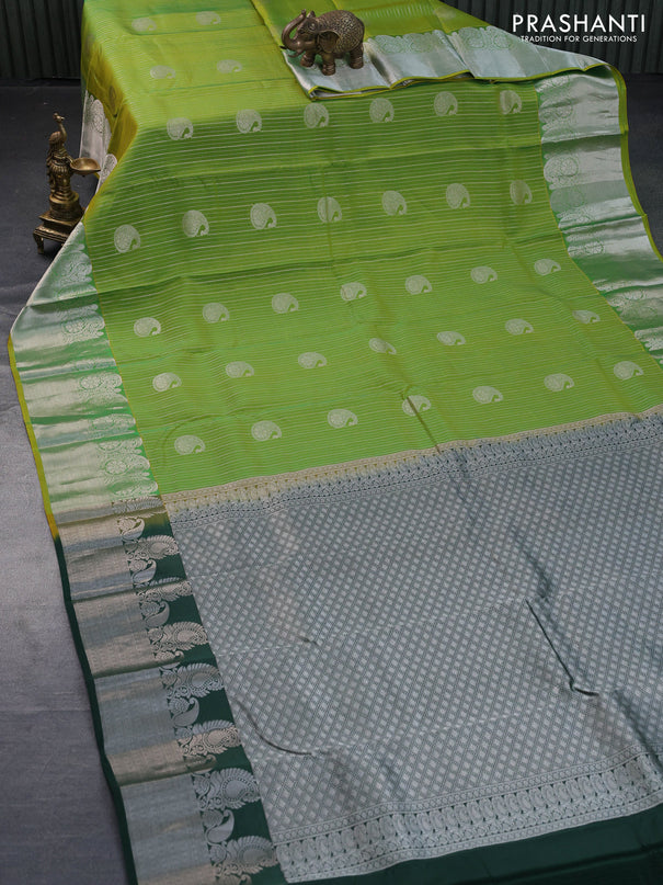 Roopam silk saree light green and dark green with allover silver zari stripes pattern & paisley buttas and silver zari woven border