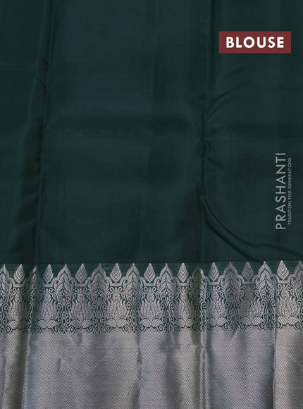 Roopam silk saree light green and dark green with allover silver zari stripes pattern & paisley buttas and silver zari woven border